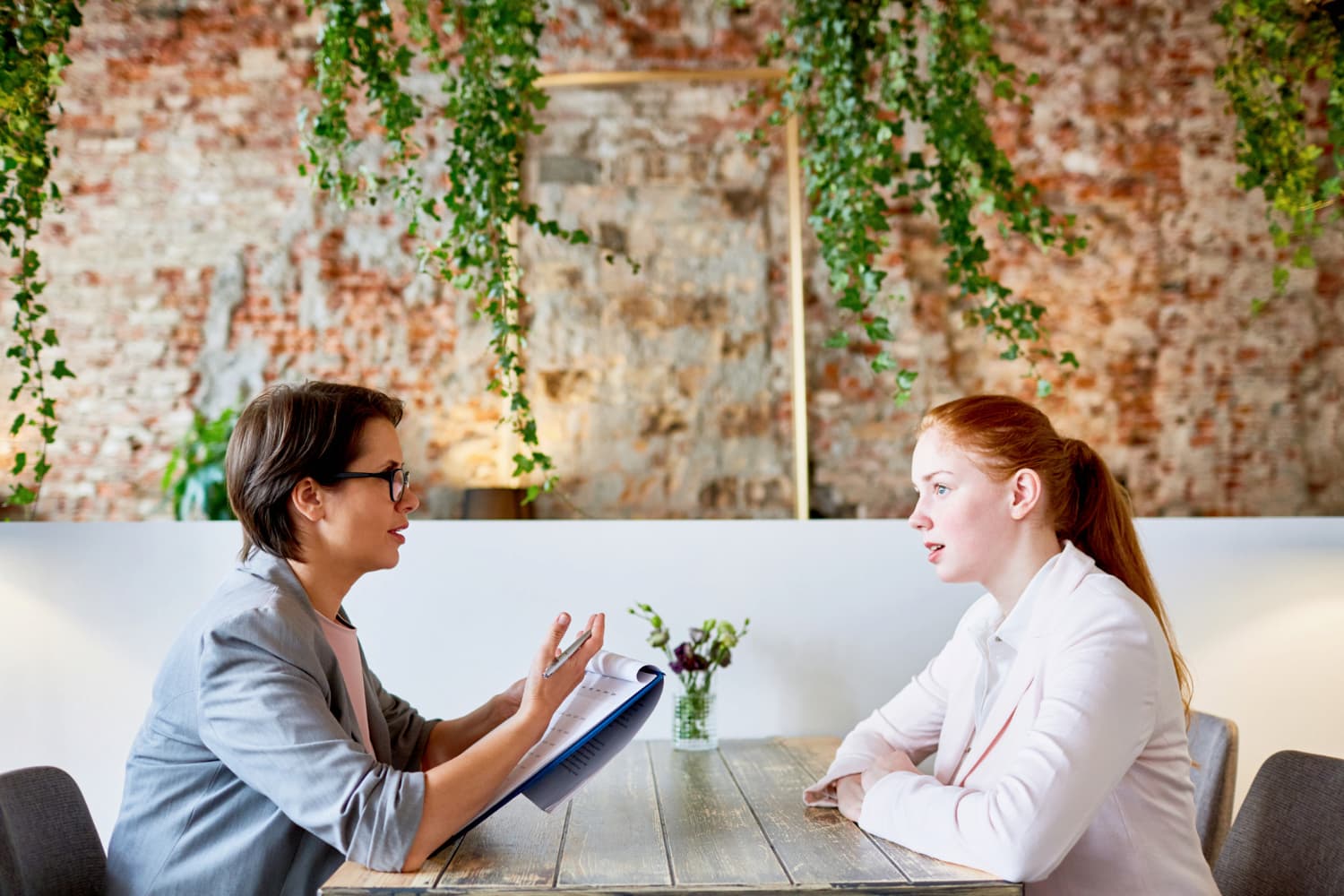 compassionate conversation between two people in a calm setting